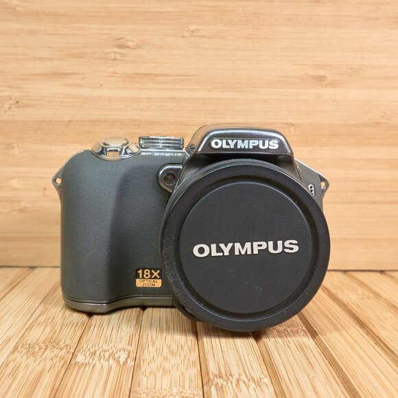OLYMPUS SP-550UZ 7.1MP Digital Camera, 18x Optical Zoom, Image Stabilization - Picture 2 of 9